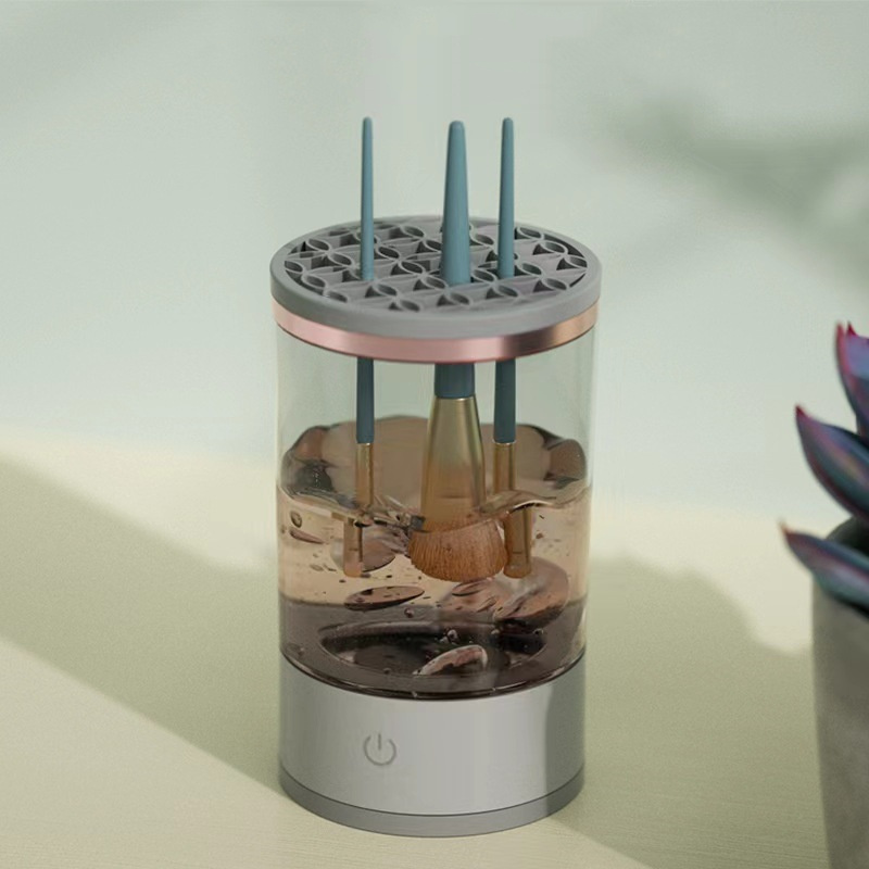 Compact makeup brush cleaner displayed on a bathroom counter